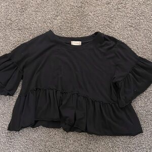 Super cute cropped all black ruffle shirt!